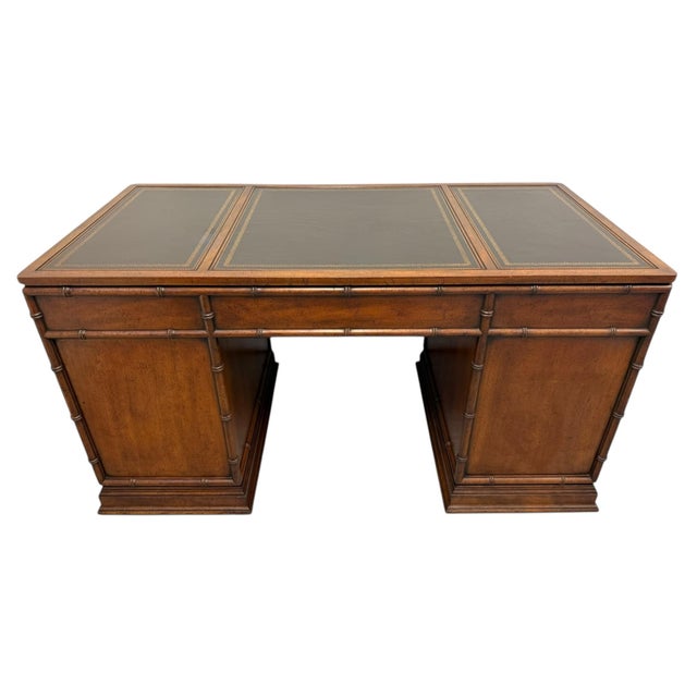 Classic campaign style faux bamboo desk by Sligh Lowry Furniture out of Holland, Michigan. Manufactured in the late 1960s....