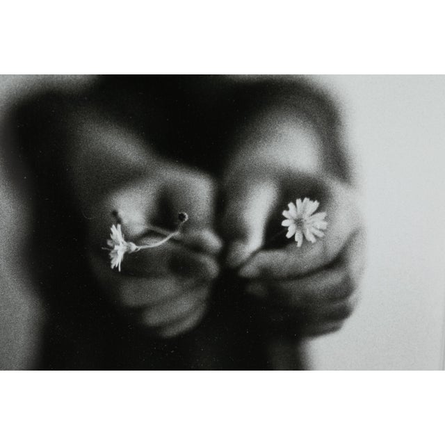 Botman, Machiel (Dutch, b.1955). "Ijke, 1993" (Boy with Flower, Rainchild). Silver Print.Hand signed in pencil (beneath...