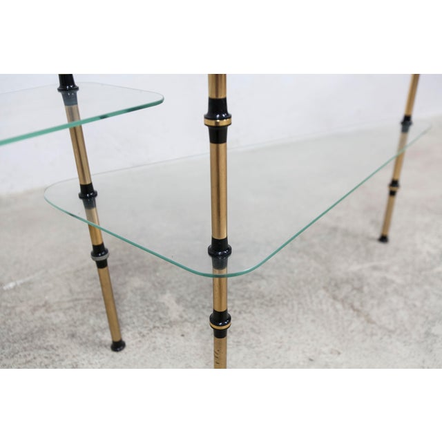 1960s bakery display case with 6 glass shelves and 4 brass and plastic legs. All glass shelves are in excellent condition,...