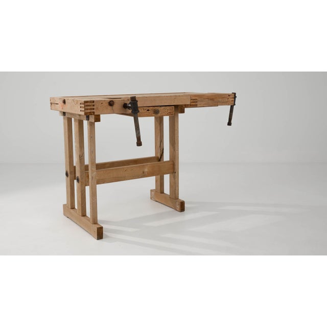 With its workmanlike design and warm natural finish, this vintage wooden table makes a striking Industrial accent. Built...