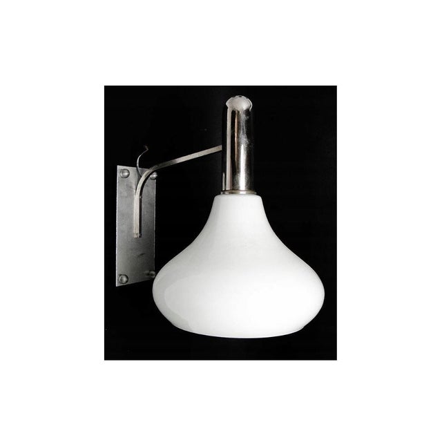 The wall lamp probably comes from the 70s. Preserved in very good condition. European Plug (up to 250V).The wiring of this...