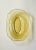 An oval yellow pressed glass bowl in the Madrid pattern made in the early 20th century by the Federal Glass Company in...