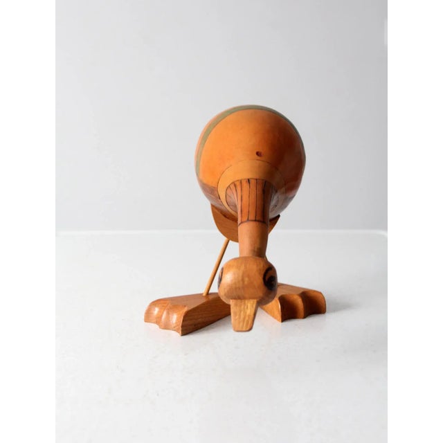 This vintage hand-made gourd art bird is sure to capture the imagination with its curious searching expression and...