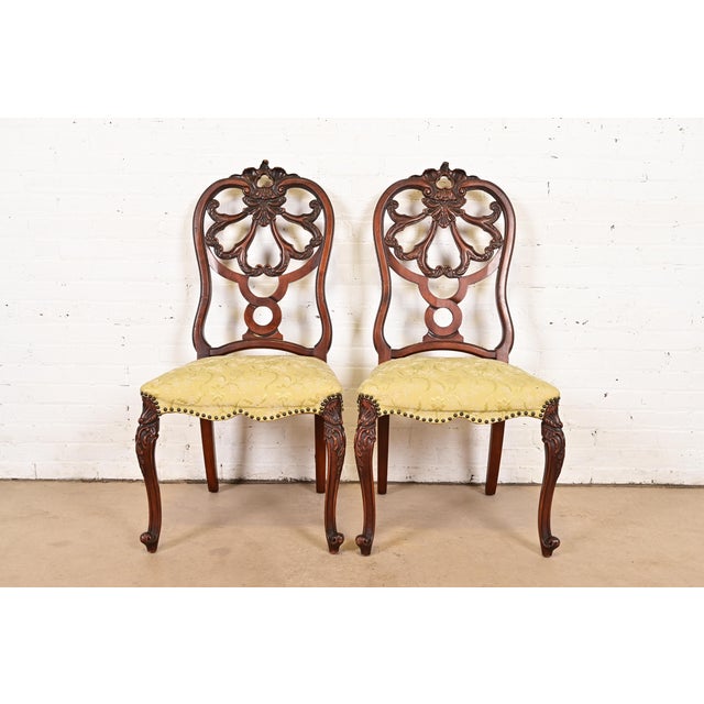 An outstanding pair of antique French Provincial Louis XV style side chairs or dining chairs By Romweber USA, Circa 1920s...