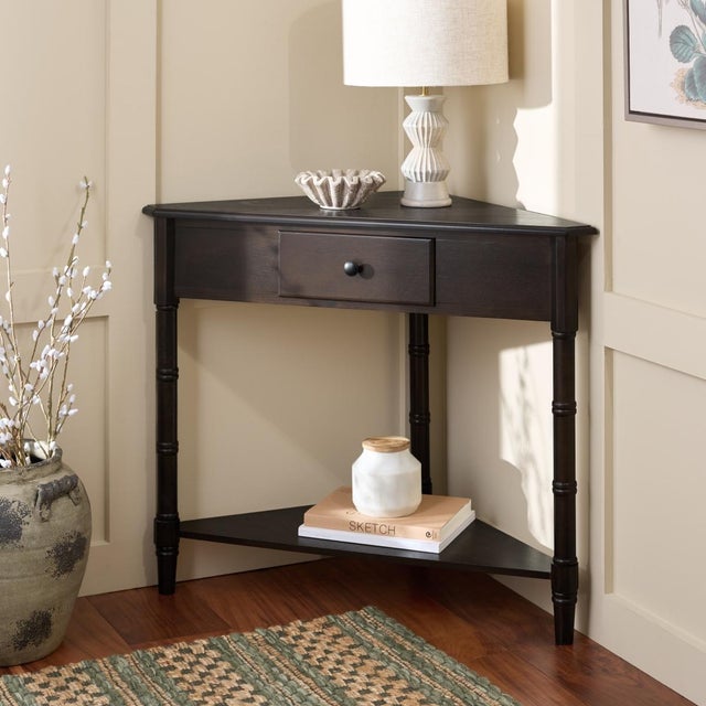This Gomez Table was designed with small living spaces in mind. Gomez's triangular pine wood frame easily fits into any...