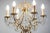1970s Spanish Hollywood Regency Brass 6-Light Chandelier With Crystals For Sale - Image 10 of 13