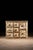 This 8-drawer apothecary cabinet features chipping white paint over exposed natural wood. Each of these drawers features...