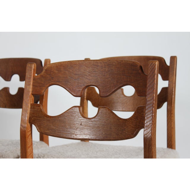 Wood Danish Razor Blade Chairs in Oak and Sheepskin from Henning Kjærnulf, 1970s, Set of 8 For Sale - Image 7 of 10