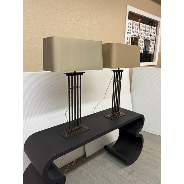 Design Plus Gallery presents a Pair of Sculpted Iron Craftsman Table Lamps by Tanner Kenzie. These timeless lamps are an...