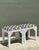 This striking pair of vintage stools effortlessly blends architectural precision with a bold, contemporary aesthetic....