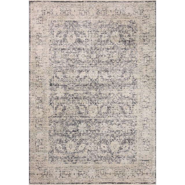 Area rugs in the Alie Collection have an elevated antique look and plush, modern feel. The rug’s underlying traditional...