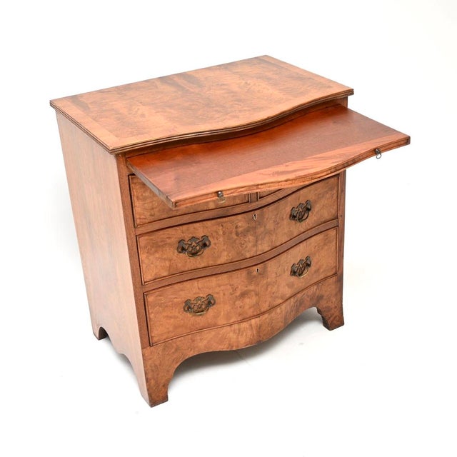 A fantastic antique Georgian style burr walnut chest of drawers. This was made in England, it dates from around the...