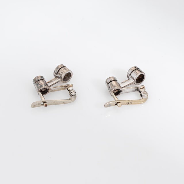 Elegant diamond drop earrings crafted in 9k white gold. Round brilliant cut diamonds range in size from 0.25 to 0.15...