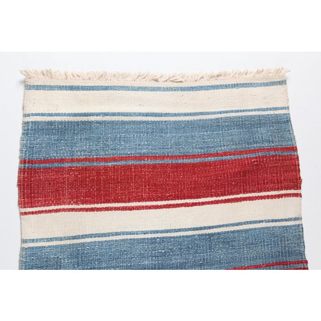 This is a one of kind old HandMade Flatweave Wool On Wool Runner Kilim,This runner kilim has a simple stripe design. This...