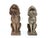 A matched pair of English mid-20th-century composite stone dogs sit upright on square bases, each holding a molded fruit...
