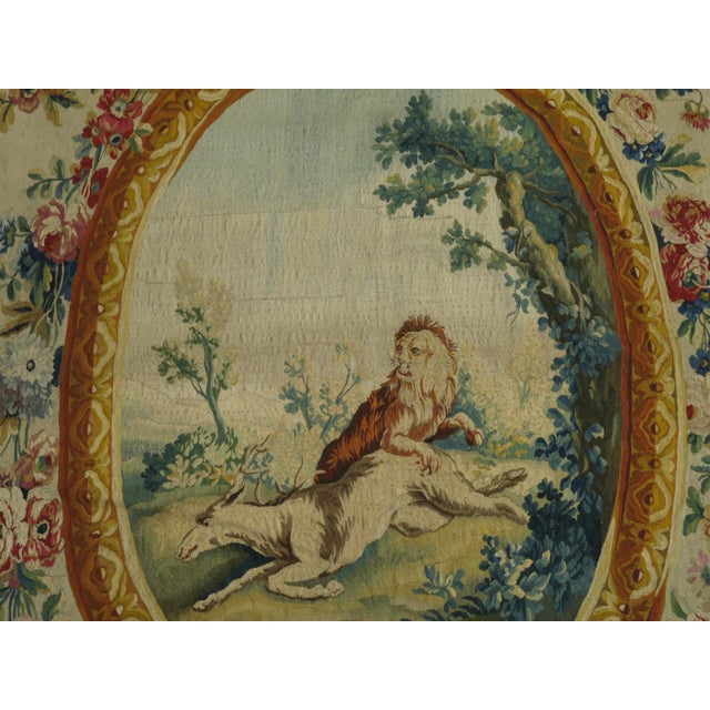 Late 18th century Aubusson tapestry panel made in France. Measures: Height 8'6'', width 10'6'' Animals in a central oval...