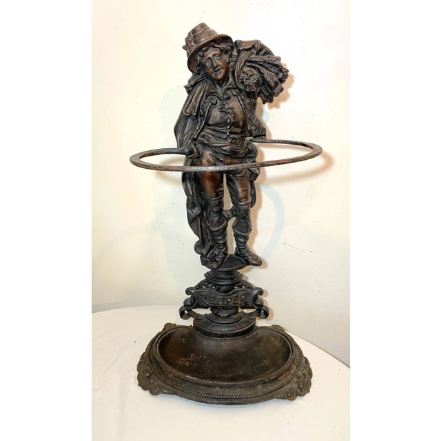 Up for sale is a very rare antique figural cast iron reaper umbrella/cane stand. It's elaborately cast out of extremely...