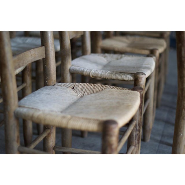 It is a batch of 12 mountain style chairs, attributed to Georges Robert in France in the 1960s. These chairs embodied the...
