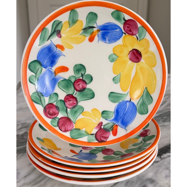 Val's Dollhouse is proud to present a set of five vibrant hand-painted decorative plates from the Art Deco era, in the...