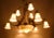 A large and extremely decorative hanging chandelier in the art nouveau style with a richly decorated brass structure and a...