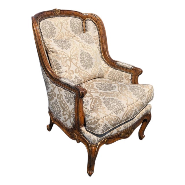 Late 20th Century French Provincial Louis XV Style Carved Wingback Bergère Chair in Damask For Sale