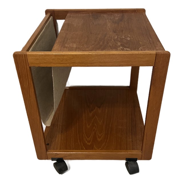Mid Century Modern 1970s Danish FBJ Mobler Teak Side Table With a Fabric Magazine Rack and Casters For Sale