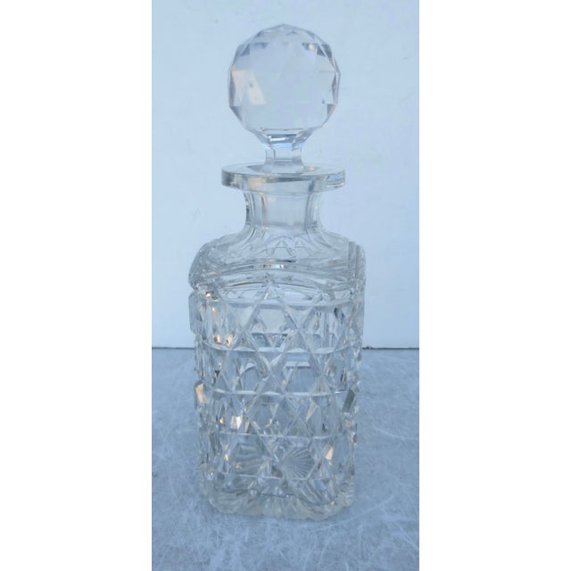 Cut Lead Crystal Decanter. No makers marks and minor oxidation to the inner wall. no chips, no cracks. The stopper has...