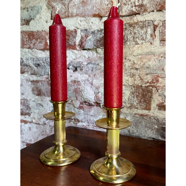 This is a pair of vintage Hallmark brass candlestick holders, handcrafted in Hong Kong. Each features a neoclassical...