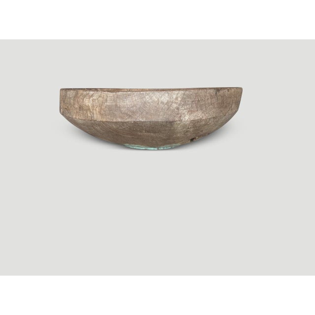 Impressive large bowl originally a drum. We added wood to the bottom and kept the turquoise color. Both usable and...