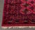 Persian Silk Bokhara Rug, with three rows of medallions on a scarlet red ground. 6' L x 3' 9" W. Provenance: From an East...