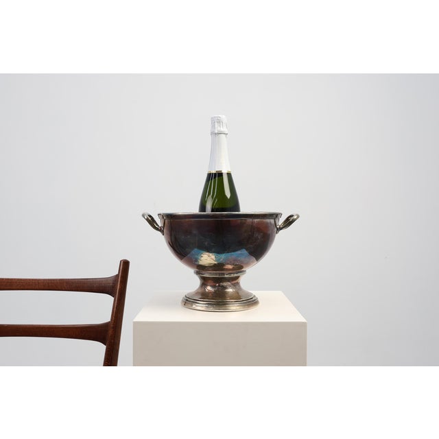 A characterful Art Deco silverplated champagne cooler, crafted in France in the 1920s and distinguished by its sculptural...