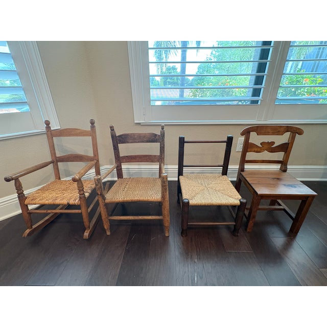 A wonderful curated collection of four antique and vintage children's chairs, each with its own distinct personality,...