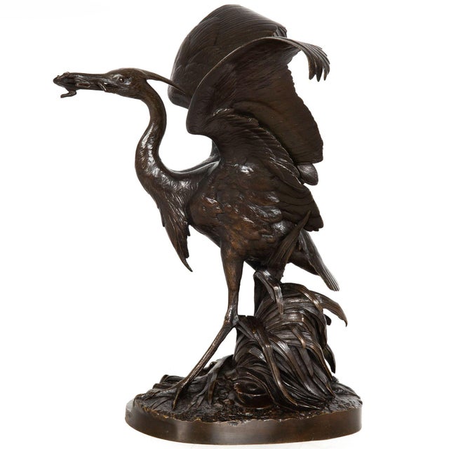 HENRI-ALFRED MARIE JACQUEMART French, 1824-1896 Le héron pêcheur (Heron Devouring a Frog) Patinated bronze, signed to base...