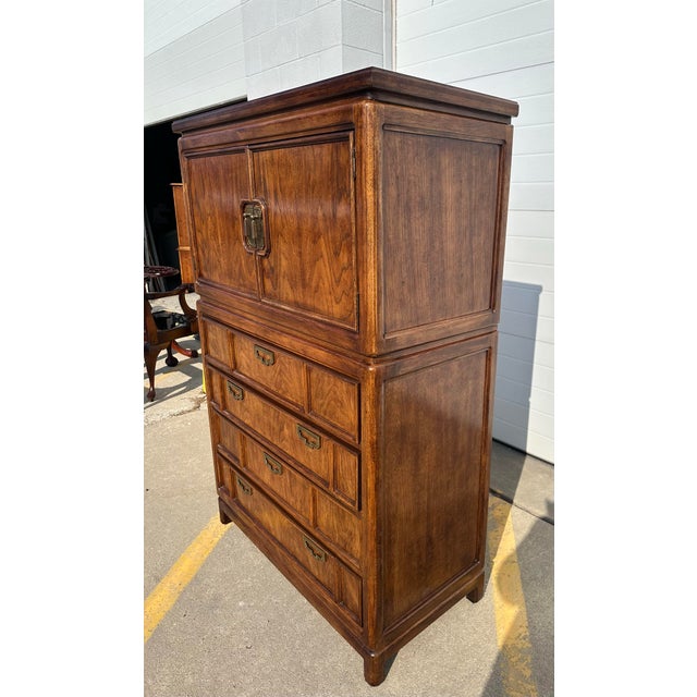 Pristine condition Thomasville “Mystique Collection” campaign style chest of drawers. Solid pecan wood with brass...