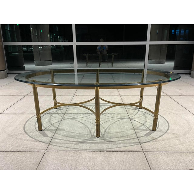 Vintage Asian influenced brass and thick glass top with ogee edge in faux bamboo, manufactured in Italy for Mastercraft,...