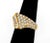 18K Yellow Gold Diamond Ring, adorned with 22 channel set baguette and 32 pave set round brilliant cut diamonds, weighing...