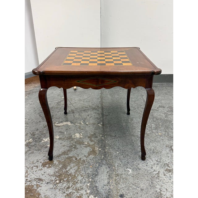 Design Plus Gallery presents a Mid-Century Italian Sorrento Reversible Game Table. This vintage table showcases a...