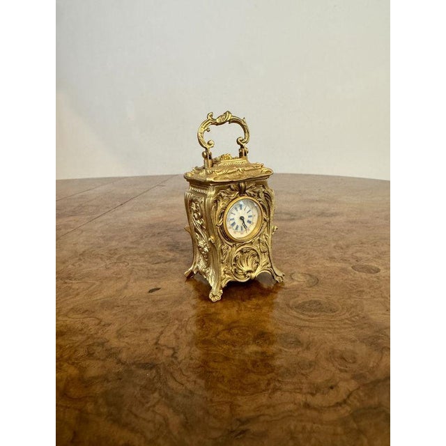 Elegant quality antique Victorian miniature carriage clock, having a beautiful quality antique Victorian ornate miniature...