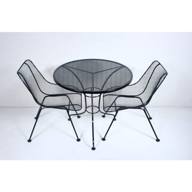 Mid 20th Century Mid 20th Century Woodard Black Wrought Iron & Wire Cafe Set with Round Table & Two Dining Chairs For Sale - Image 5 of 12