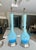 Pair mid century long neck Murano Italian light transparent blue glass (with darker applied blue color at base) table...