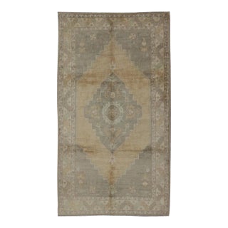 Muted Mid-20th Century Vintage Oushak Rug With Medallion in Camel 5'5 X 9'4 For Sale