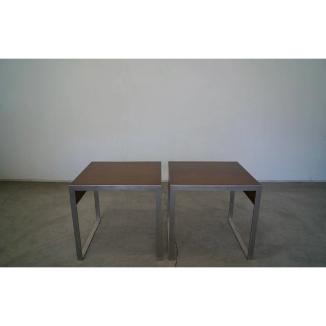 Pair of Mid-century Modern style side tables for sale. Manufactured by high-end furniture company Bernhardt Furniture, and...