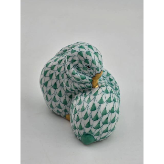 This rare vintage Herend Hungary figurine features a pair of snuggling bunny rabbits in green with a fishnet design. Made...