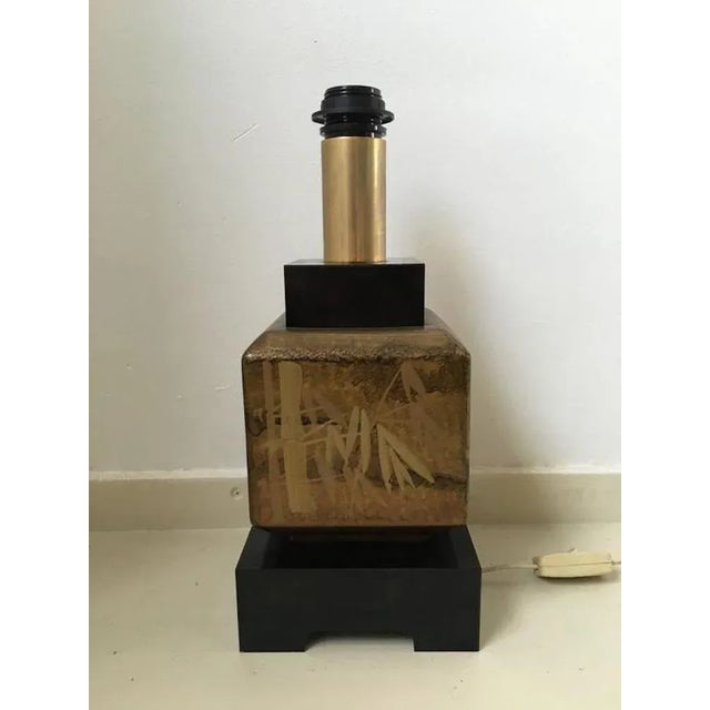 Nicely decorated with a bamboo pattern and black lacquered base. Very luxurious look. This lamp consists of wood, ceramic...