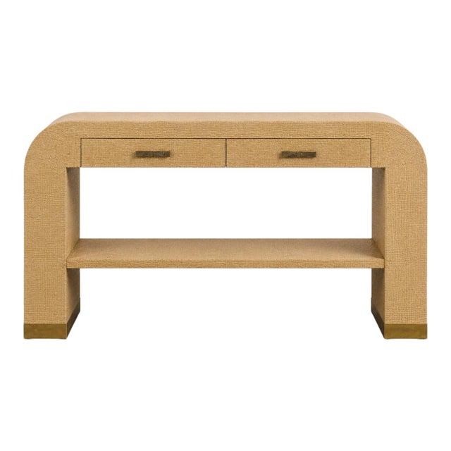 This is a 1970s grasscloth wrapped waterfall console table in the manner of the iconic German furniture designer, Karl...