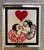Vintage Needlepoint Artwork Featuring an Art Deco-Style Kissing Couple Beneath a Red Heart.
