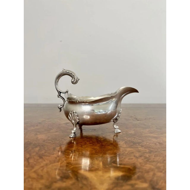 Outstanding quality pair of antique George III silver sauce boats having an outstanding quality pair of solid silver sauce...