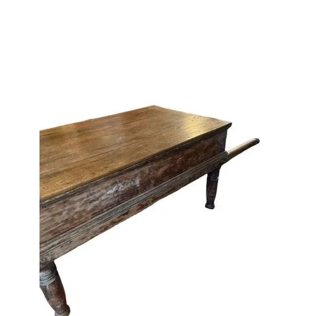 A late 19th century Spanish processional table of carved wood, from Guatemala. Measures 54"W x 33"D x 23.5"H. A dramatic...