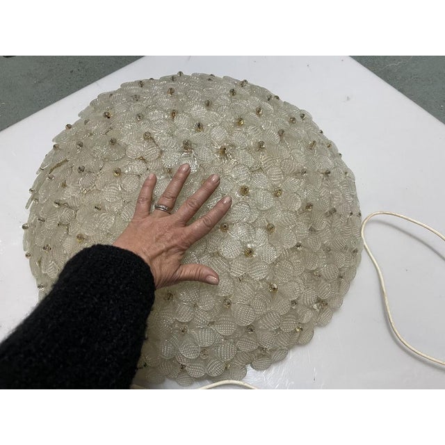 An impressive large Murano glass flush mount ceiling light attributed to Seguso, dating from the 1960s. This sculptural...