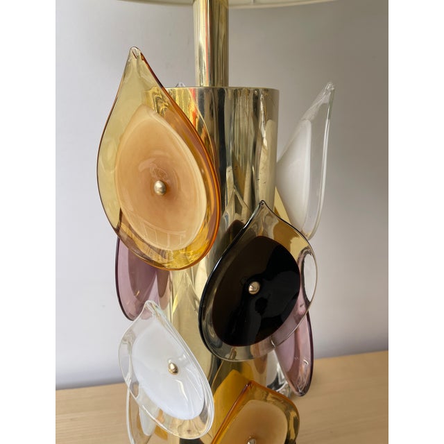 Pair of table or bedside brass lamps and blown multicolor Murano glass flame. Contemporary work from a small italian...